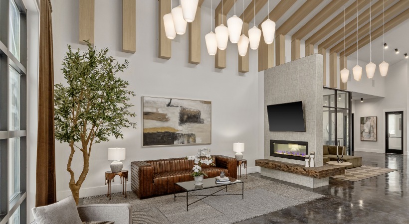 Clubhouse with seating and fireplace City North in Pensacola, FL