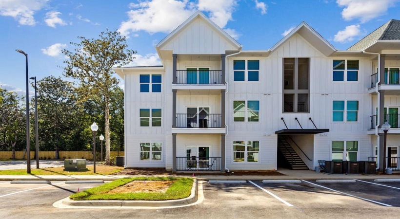 a building with a parking lot